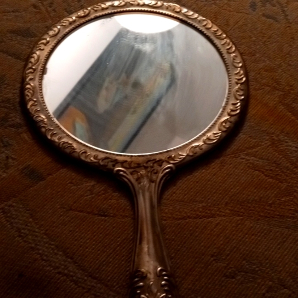 Antique embossed victorian silver plated hand mirror